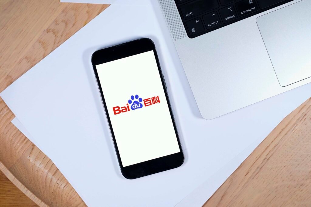 Baidu logo on a mobile smartphone as the China tech giant unveils ERNIE X1 Turbo and 4.5 Turbo, two fast models that boast impressive performance in benchmarks alongside dramatic cost reductions.